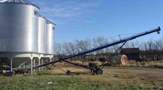 Grain Bins and an Augur